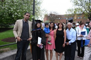 Charu with her family at graduation, 2014